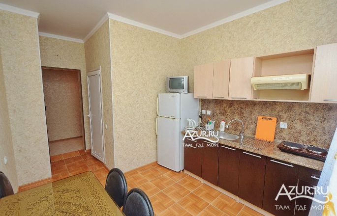 Двухкомнатный номер с балконом и кухней Двухкомнатный номер с балконом и кухней